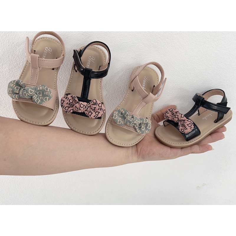 Sandal đính nơ vải canvas xinh cho bé gái (sz 22 - 26), dép quai hậu da PU cao cấp đính nơ vải (2215) (đen, hồng nhạt)