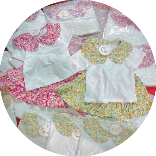 Bộ bé gái trắng cổ sen tròn hoa và chân váy đuôi cá hoa nhí liền quần XHN881