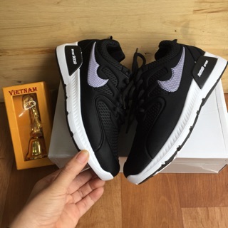 Giày thể thao độn đế nữ