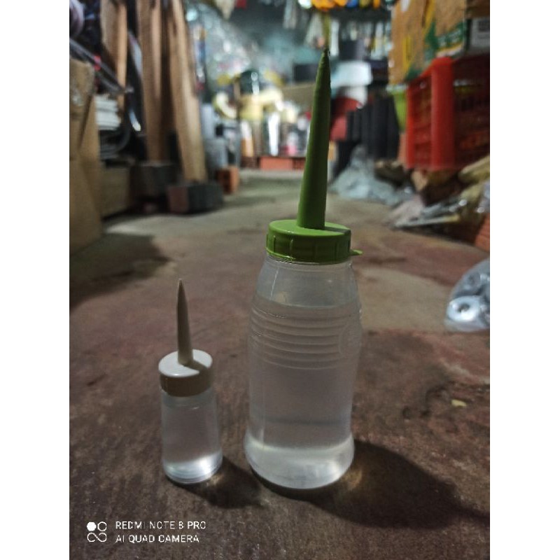 Dầu máy may trắng trong 30ml và 200ml kèm lọ đựng dùng tra quạt, đồ điện