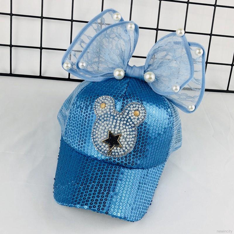 Mũ lưỡi trai đính nơ và họa tiết ngôi sao lấp lánh cho bé