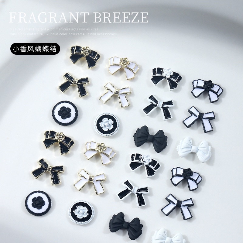 Charm nơ đính móng tay đen trắng
