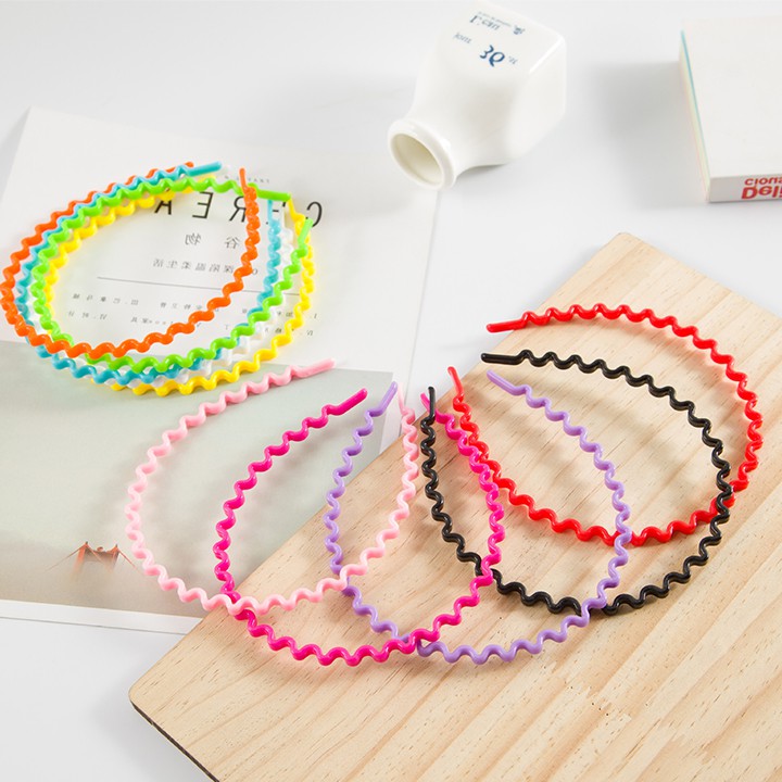 Bờm tóc nhựa lượn sóng nhiều màu đen cho nữ bé gái youngcityshop 30.000