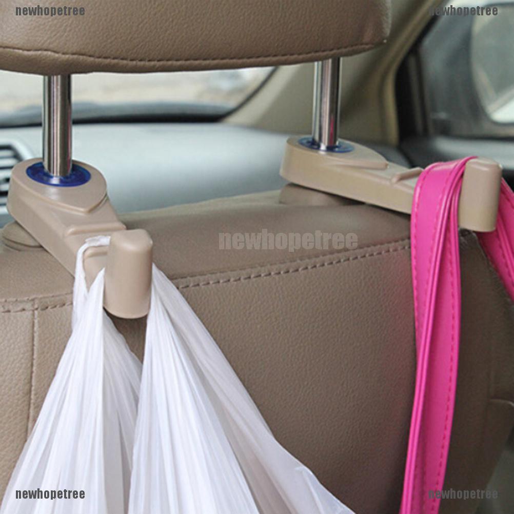 2 móc giữ đồ với chân cố định ở thanh giữ gối dựa đầu trong xe hơi