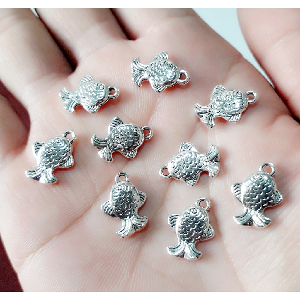 Sỉ charm bạc cổ chất liệu Hợp Kim handmade : 50g = 25k / 1 gói