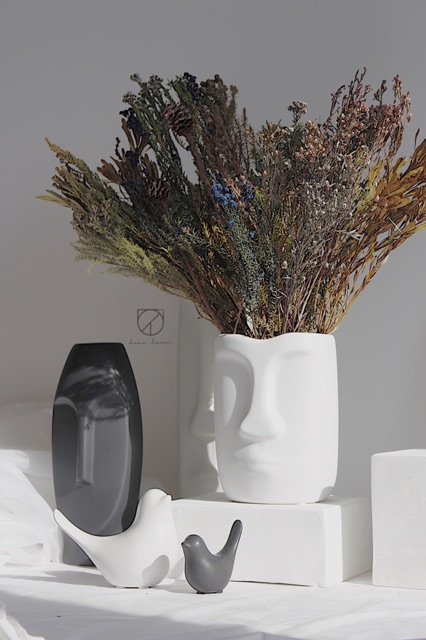 Bình hoa gốm hình nhân  Rushmore