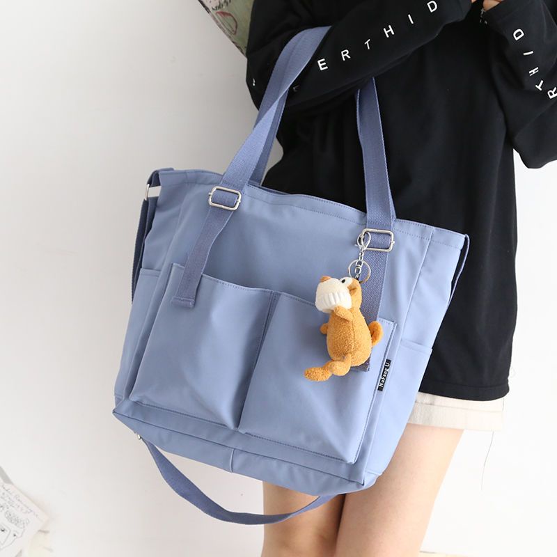 Túi Đeo Vai / Xách Tay Bằng Nylon Chống Nước Sức Chứa Lớn Màu Sắc Trơn Có Tay Cầm Dành Cho Học Sinh Nam