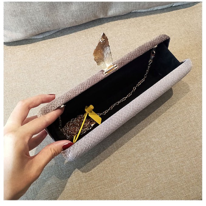 Cốp da rắn - Clutch da rắn  khóa hình chiếc lá đi tiệc siêu sang Dài 25 X rộng 8 CM, đựng vừa điện thoại, son môi