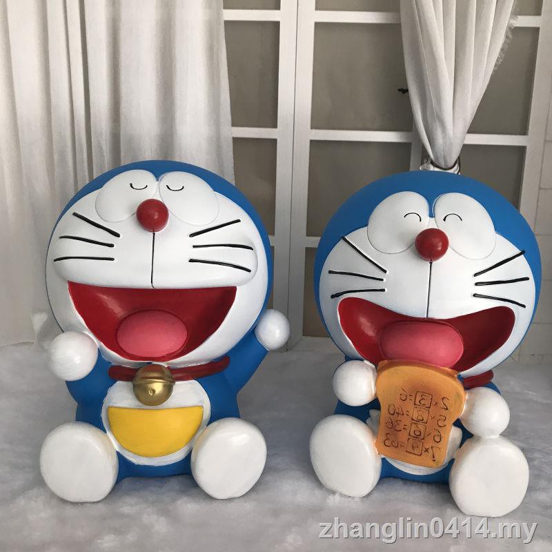 Ống Heo Tiết Kiệm Tiền Hình Mèo Máy Doraemon Chống Rơi Dành Cho Nam Và Nữ