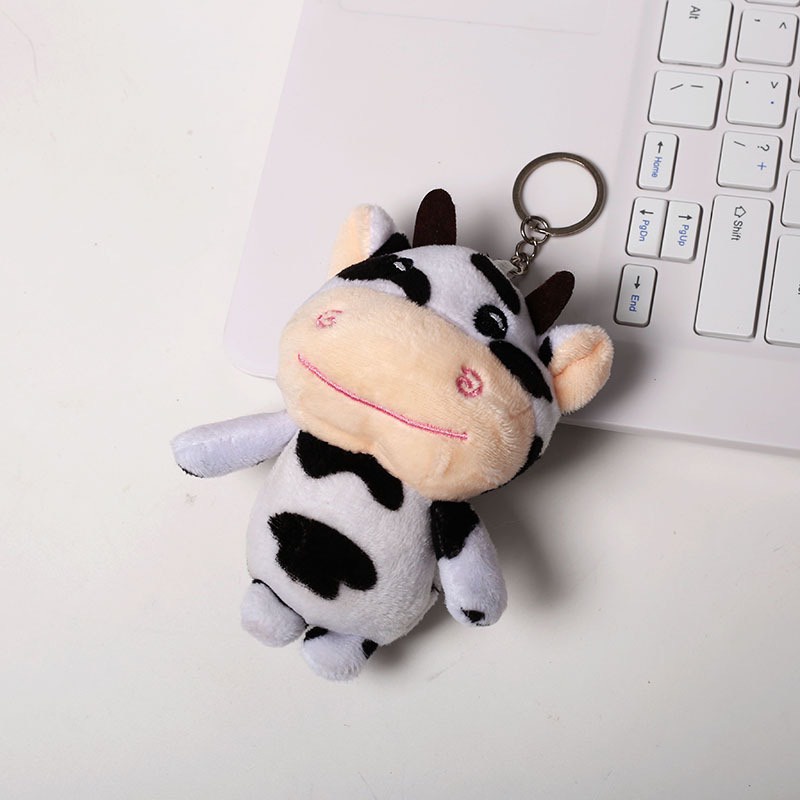 Móc Khoá , Móc Cài Balo Bông Hình Chú Bò Sữa Đáng Yêu