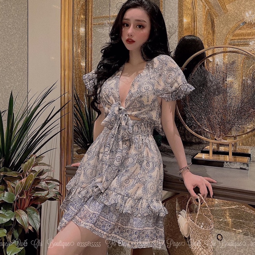 Đầm tiệc hoạ tiết xanh hở lưng