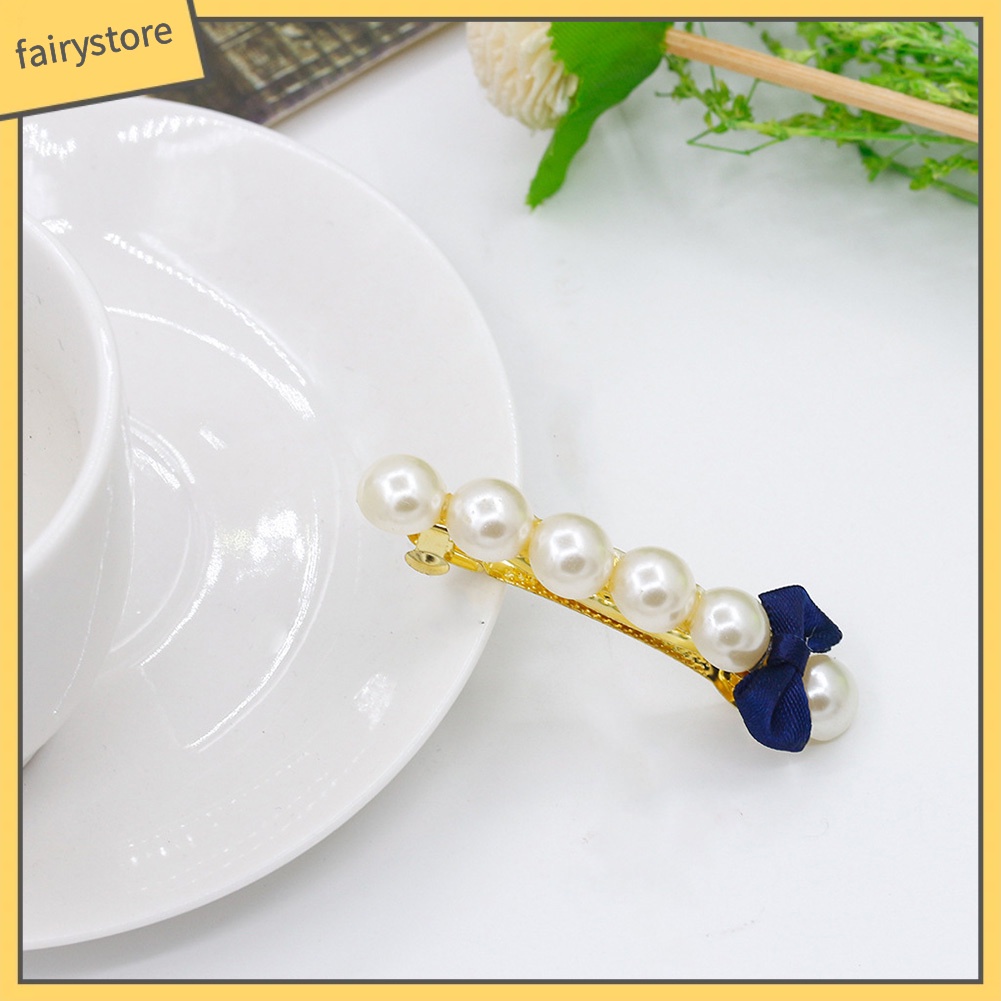 Kẹp tóc hình nơ đính ngọc trai thời trang