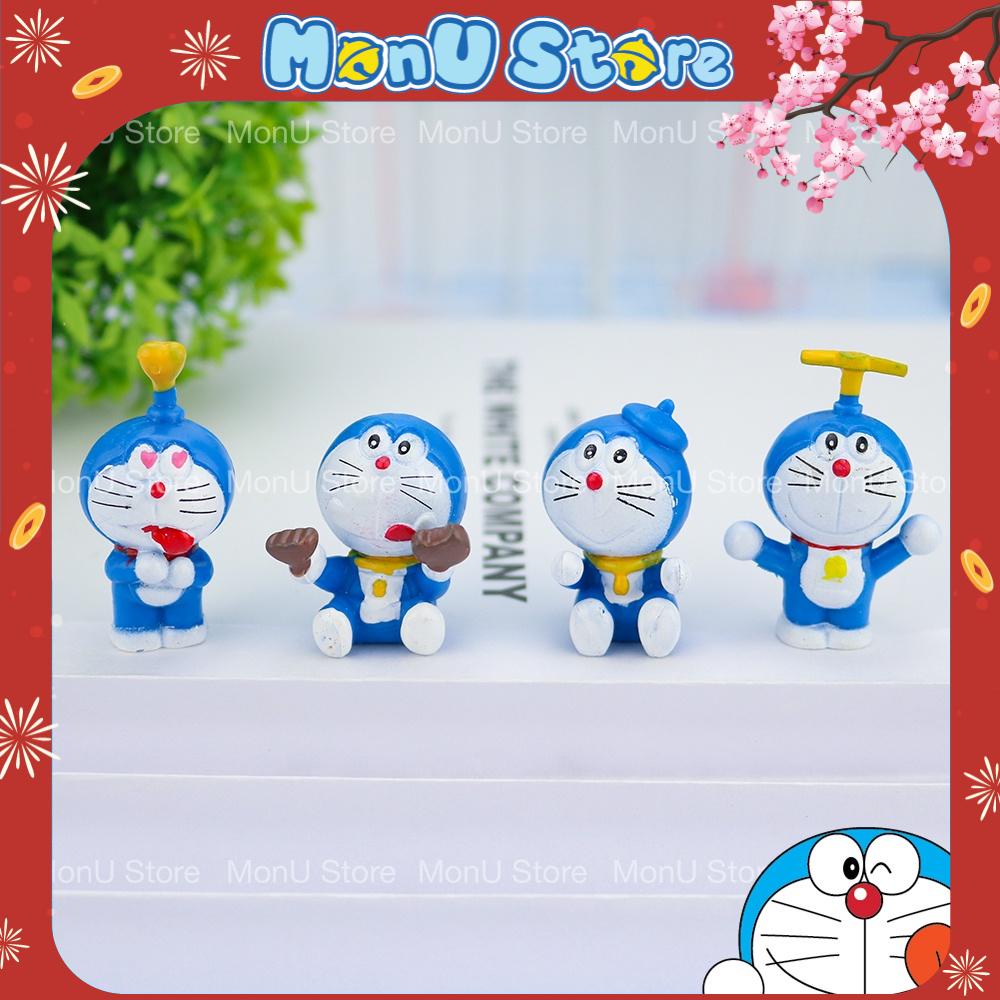 Mô hình DORAEMON DOREMON ăn bánh dễ thương cute MON0135