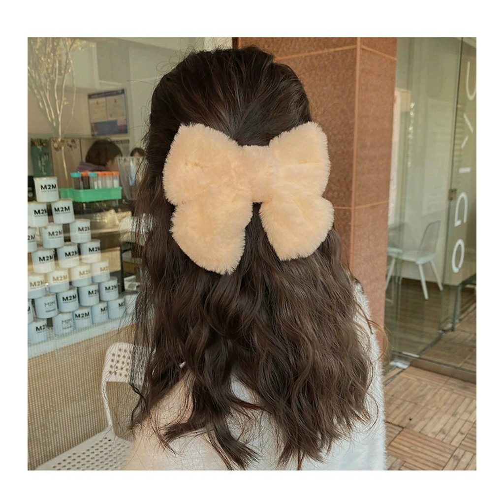 Kẹp tóc nơ bông cực dễ thương