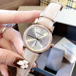 (Thẻ bảo hành 12 tháng) Đồng hồ nữ Burberry viền đính đá, chống xước, bảo hành 12 tháng MTP-STORE
