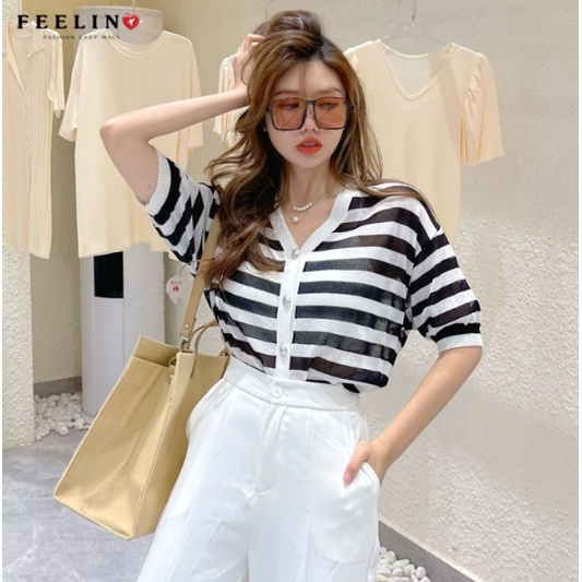 Crop top sọc ngắn. Chất liệu dệt kim phom dáng rộng rãi, thoải mái- tạo nên vẻ ngoài rất đẹp và cá tính