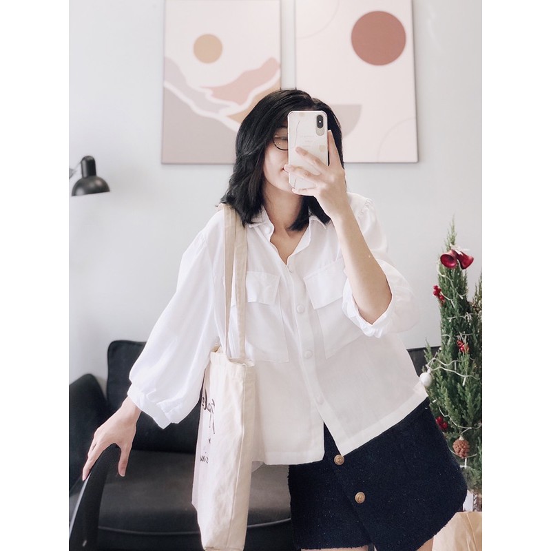 Áo sơ mi trắng lửng tay lỡ,nút bọc