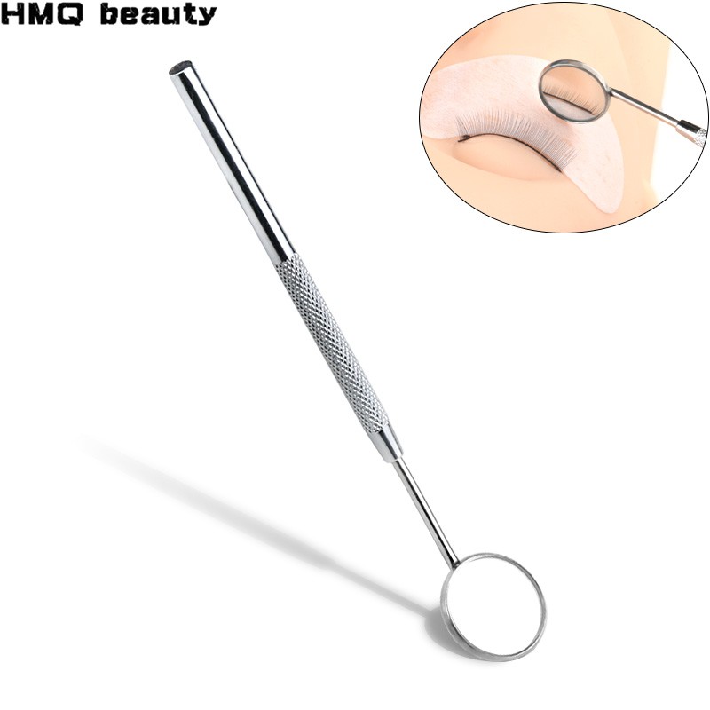 Một gương răng thép không gỉ để kiểm tra sự giãn nở lông mi bằng thiết bị in Mi-Press.