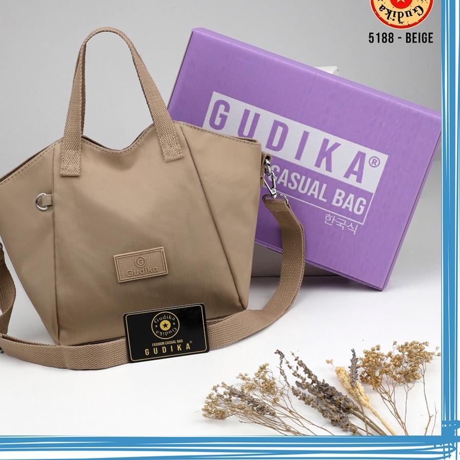 Bán Chạy nhất! Túi Đeo Vai gudika 5188 Chính Hãng - Túi Đeo Chéo gudika Kece Chống Nước Hàng Nhập Khẩu - Chất Liệu Nylon Chống Thấm Nước - Hàng Hiệu - Túi mini Thời Trang Cho Nữ - Túi Xách Có Dây Đeo - Thương Hiệu - Hàng Hiệu - Túi mini - Hàng Hiệ Túi - Đ