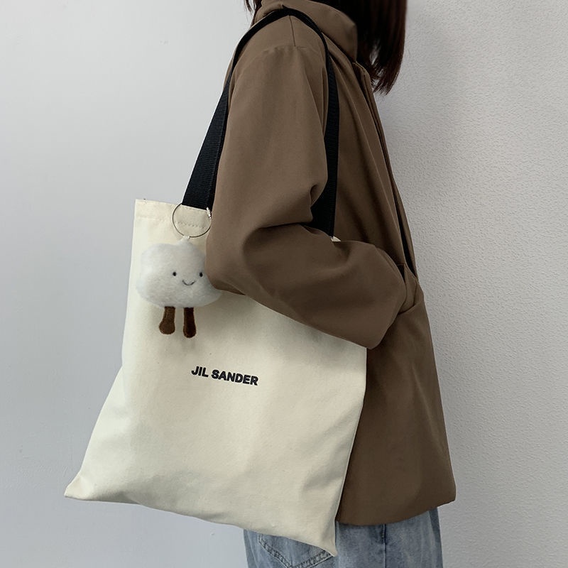 1 Ba Lô Vải canvas Màu Trắng Đen Đơn Giản