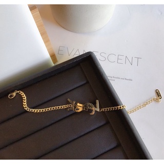 Saint laurent vòng tay thép titan mặt chữ ysl sang trọng