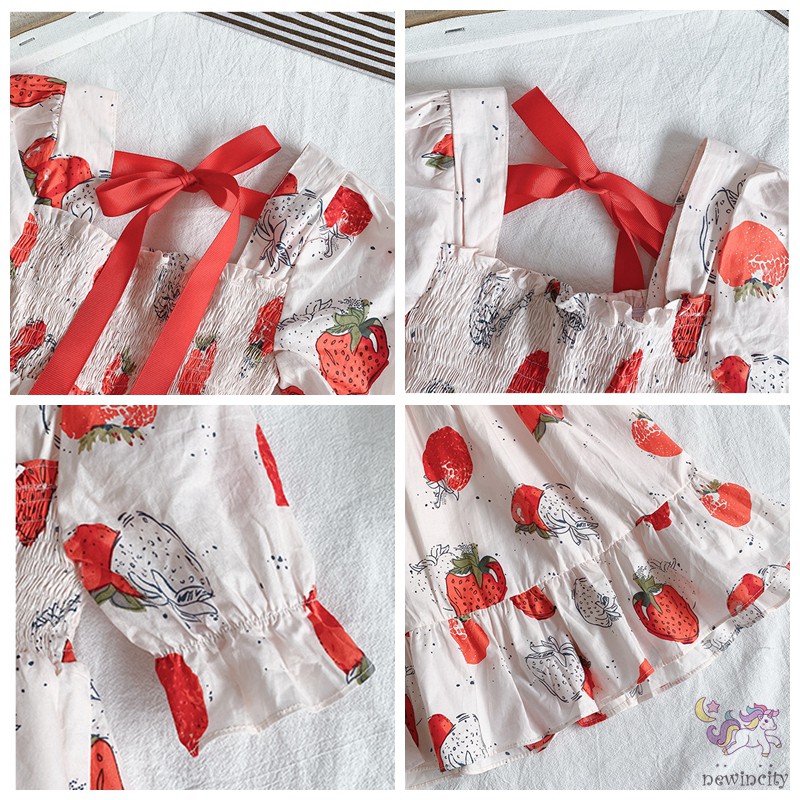 Đầm xòe tay phồng in hình quả dâu dễ thương dành cho bé gái