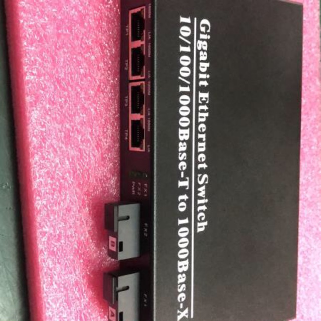 Thiết bị chuyển quang 4LAN 1000Mb 2 ngõ quang