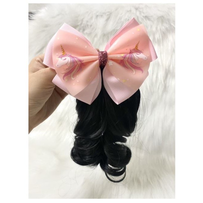 Kẹp nơ tóc xoăn cho bé