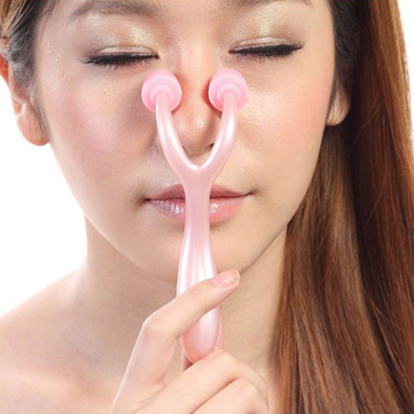 Dụng cụ lăn massage mũi chất liệu nhựa tiện dụng