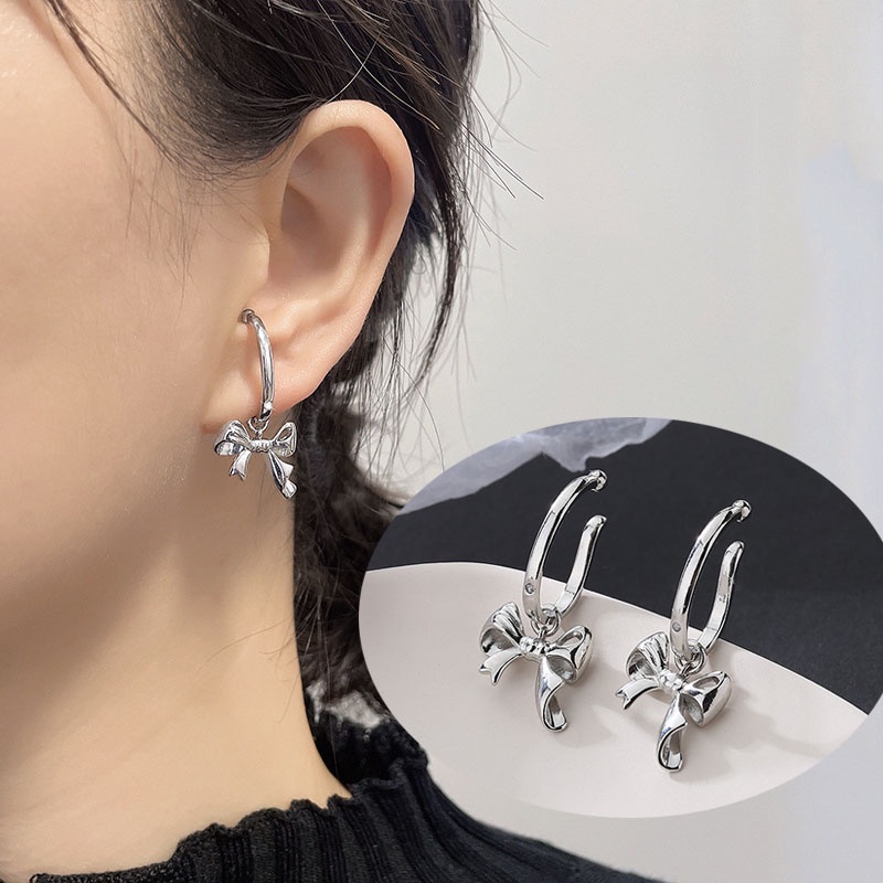 Bông Tai Dạng Kẹp Hình Nơ Màu Bạc Dễ Thương Cho Nữ