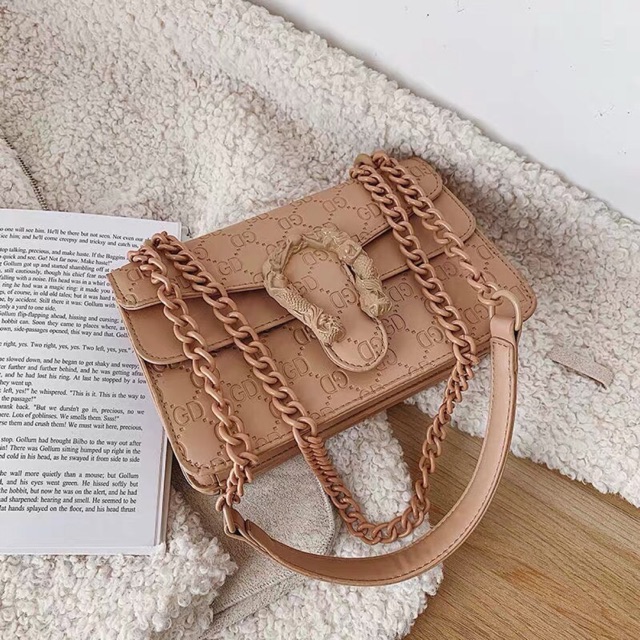 Túi đầu rồng vân GD