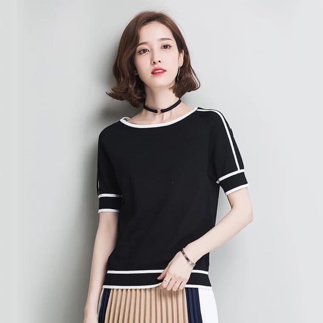 Áo len mongtoghi chất len mịn, áo màu đen kết hợp viền trắng tạo độ sáng cho áo ,đặc biệt áo len này thấm hút mồ hôi cực