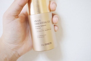Tinh chất dưỡng da Snail Essential EX Wrinkle Solution Essence