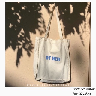 “OT HER” tote bag.