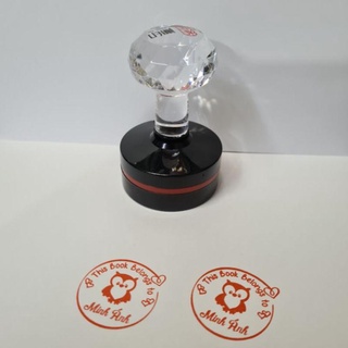 Con dấu flash in logo, tên shop đóng lên giấy, bìa carton