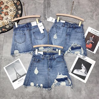 Chân váy jeans rách vạt lệch