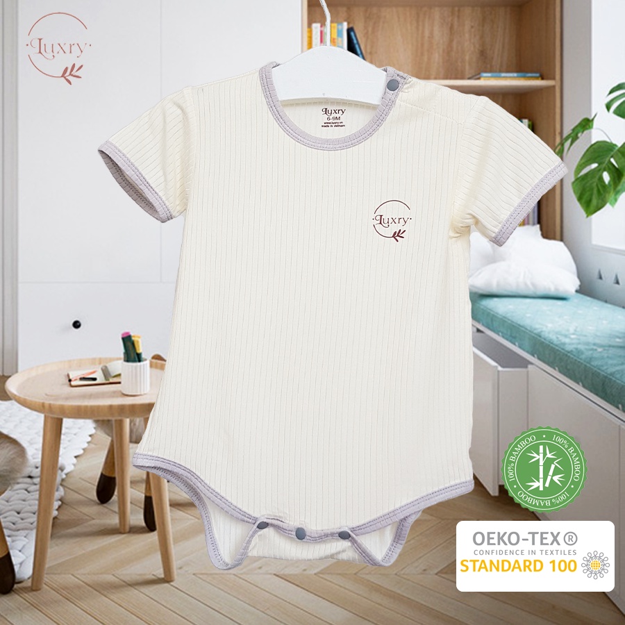 Bộ quần áo liền thân Body chip Luxry nền vàng be phối viền cho bé sơ sinh size từ 0 đến 12 tháng
