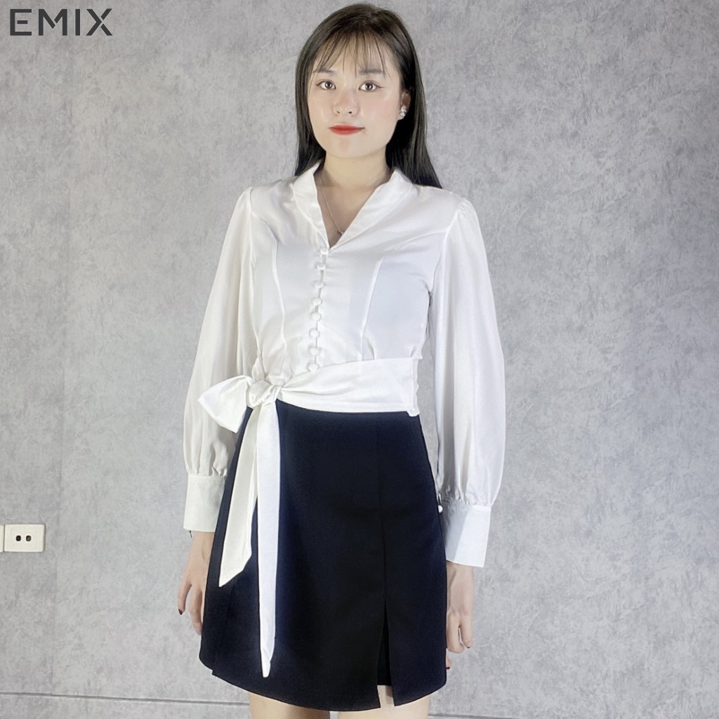 Áo croptop cúc bọc buộc nơ EMIX (màu trắng), dáng ngắn, cổ vest, dài tay, chất lụa mềm mại, không nhăn