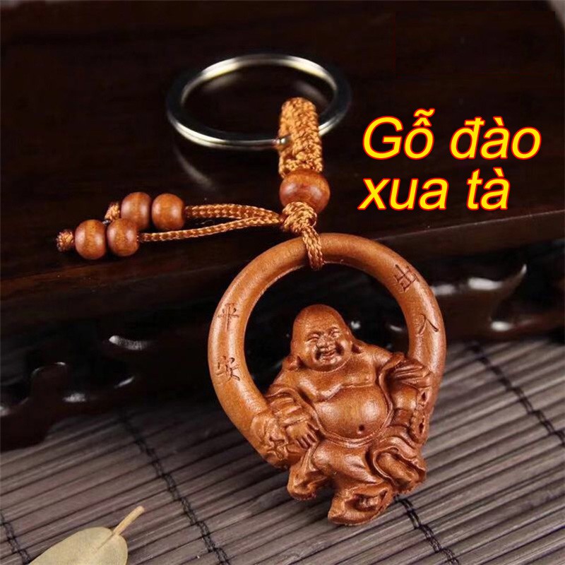 Móc khóa Phật Di Lạc gỗ đào đuổi tà khí xua tan tai họa