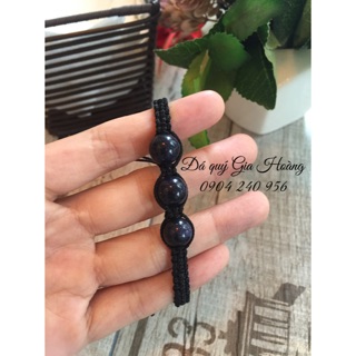 Vòng tết dây đá Kim Sa đen