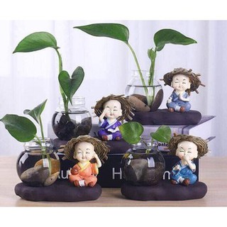 Bộ tượng 4 không an lạc bên bình thủy tinh