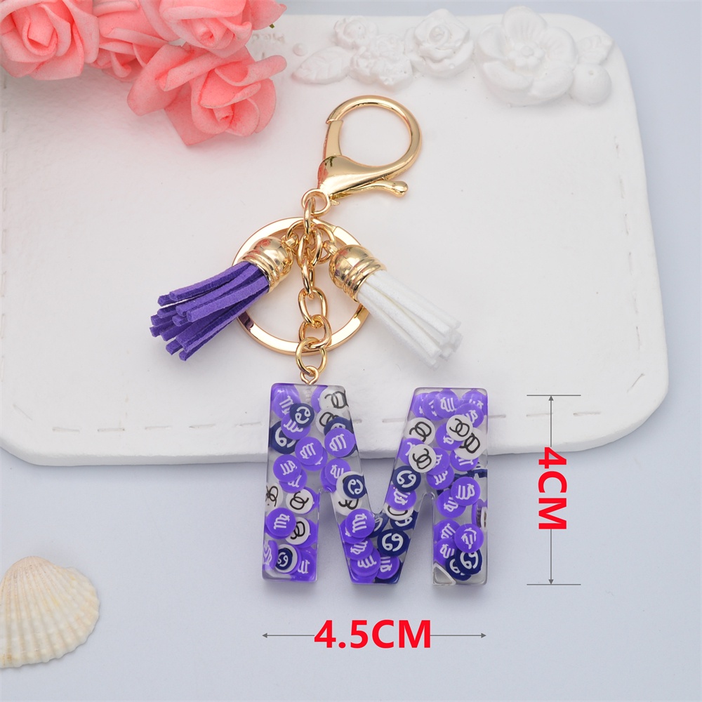 Móc Khóa 26 Chữ Cái Gắn Núm Tua Xinh Xắn Charms