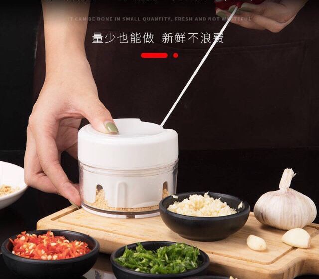 Dụng cụ xay tỏi , thịt , thực phẩm bằng tay đa năng