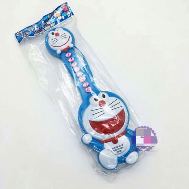 Đồ Chơi Đàn Guitar Doraemon Dùng Pin Có Nhạc Tiếng Việt