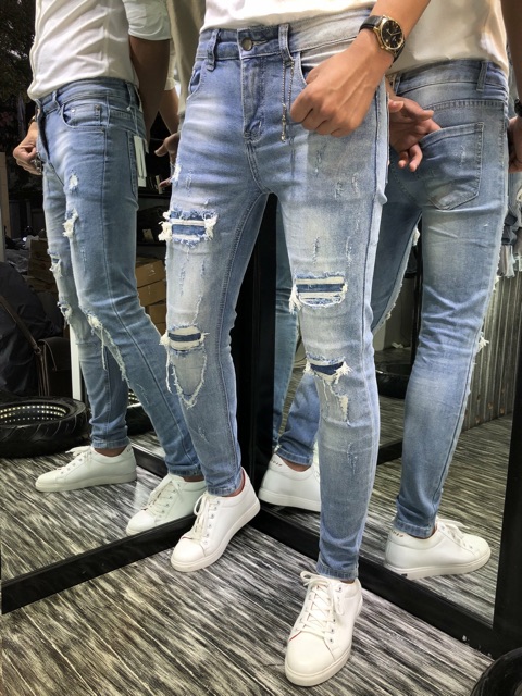 Jeans co giãn khoá zip rách gối