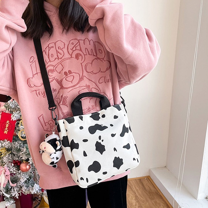 Túi đeo chéo nữ vải canvas họa tiết bò sữa đi học đi chơi vừa khổ A4 Thời Trang Hazin