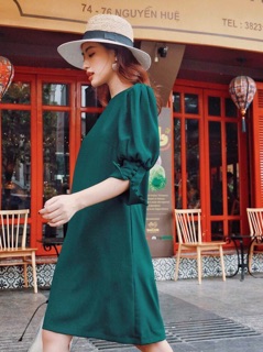 Đầm xanh tay nút bọc
