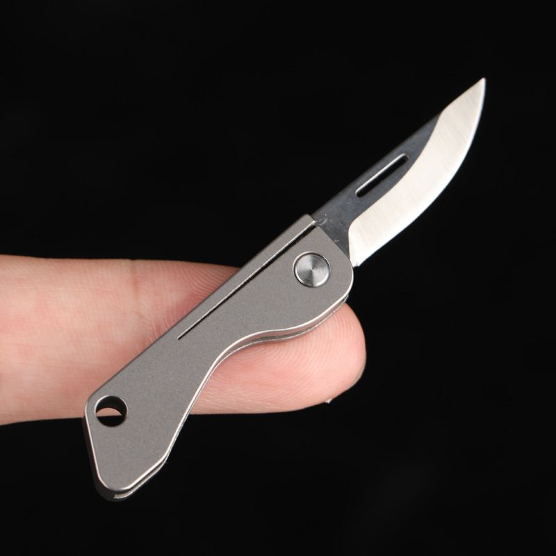 Móc khóa titanium kèm lưỡi dao