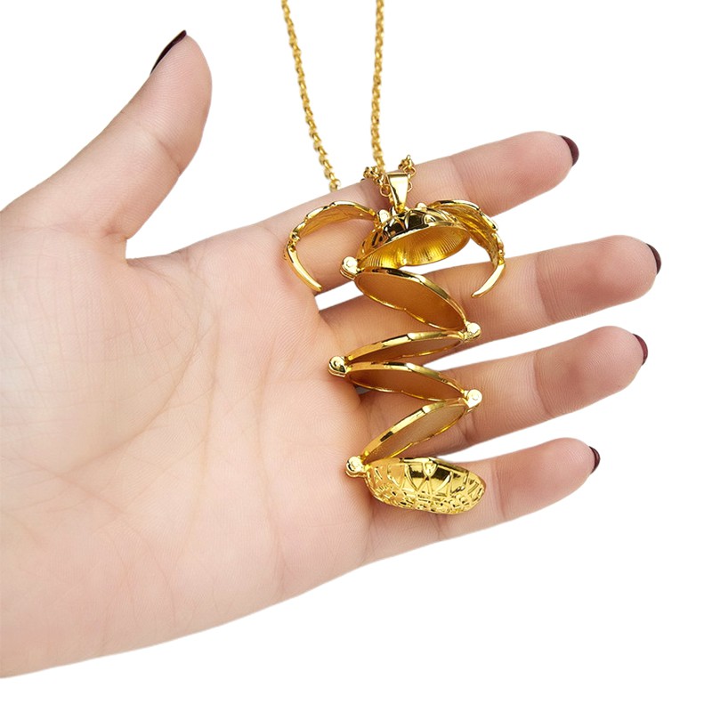 Mặt dây chuyền hình trái tim và đôi cánh thiên thần kèm 4 ngăn để ảnh độc đáo