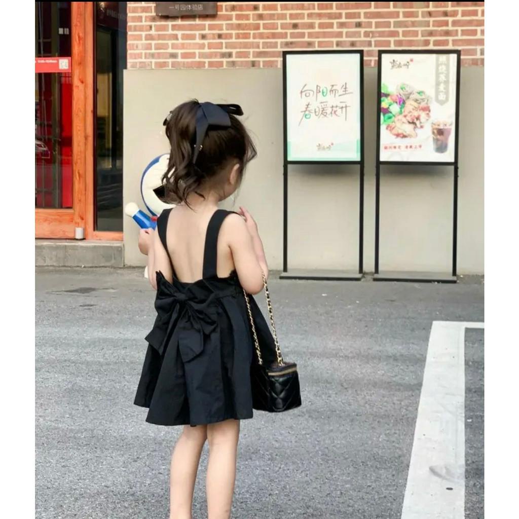 Váy hai dây có nơ sau lưng cho bé nhà mộc baby v123
